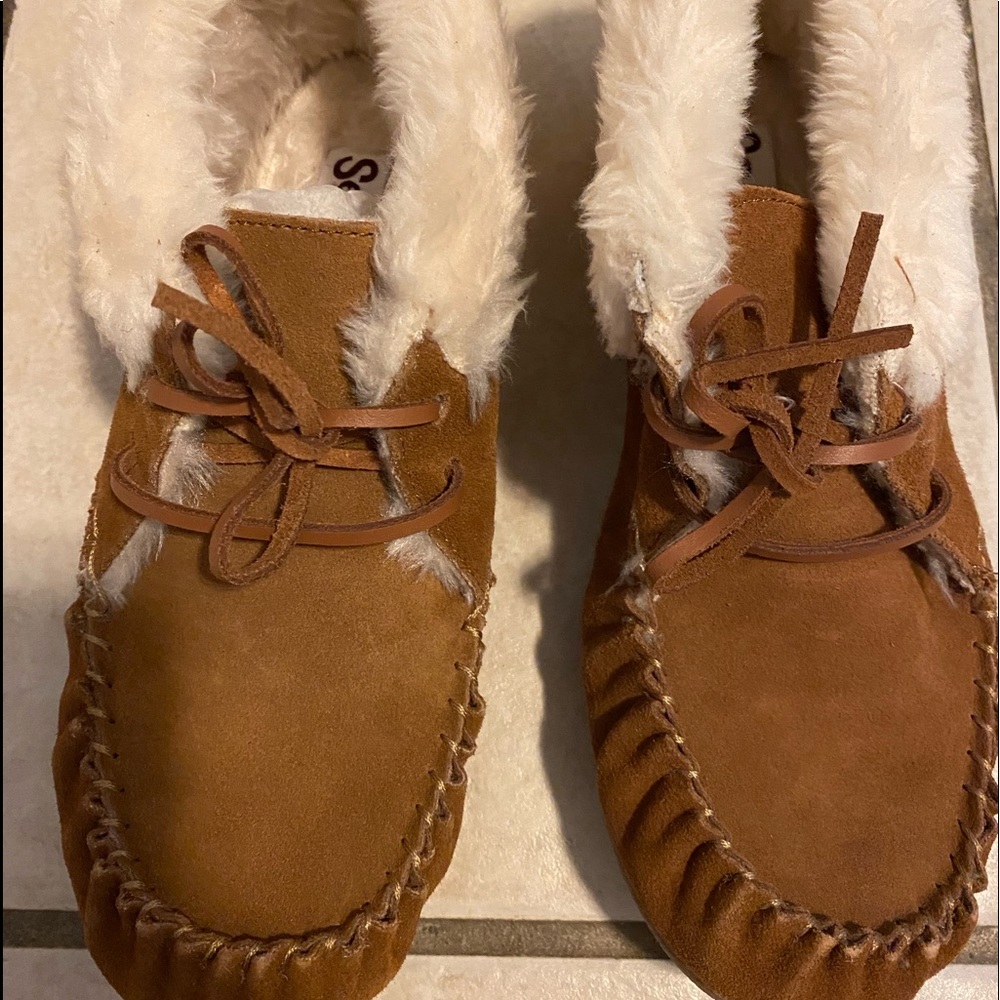 Woman’s soft moccasin shoes